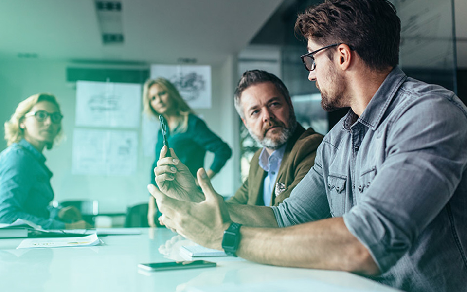 Image of a group brainstorming session at a business, showing how Miet Temporary Staffing can boost a companies workload capacity