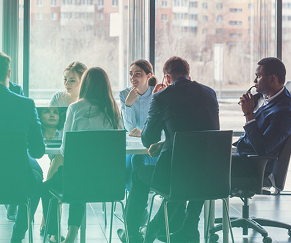 Image of a boardroom meeting, showing how Mier Temporary Staffing can boost a companies capacity